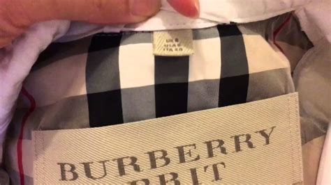 how recognize burberry jacket is real|genuine burberry coat logo.